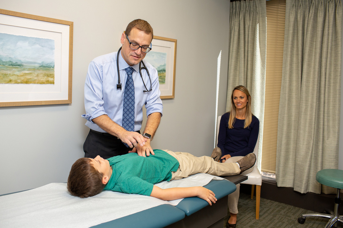 naturopathic doctor examining patient