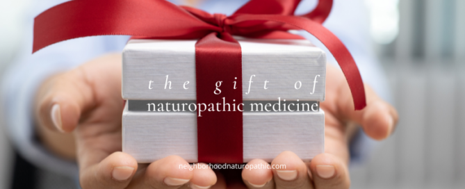 wrapped holiday present with the overlay of words "The Gift of Naturoapthic Medicine" to indicate Holiday Wellness, Prioritizing Sleep, Nutrition for Well-Being, Staying Active, Stress Management, and Naturopathy in Minneapolis St Paul