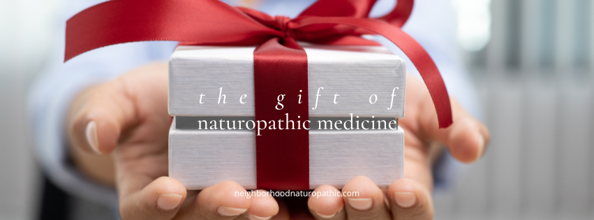 wrapped holiday present with the overlay of words "The Gift of Naturoapthic Medicine" to indicate Holiday Wellness, Prioritizing Sleep, Nutrition for Well-Being, Staying Active, Stress Management, and Naturopathy in Minneapolis St Paul